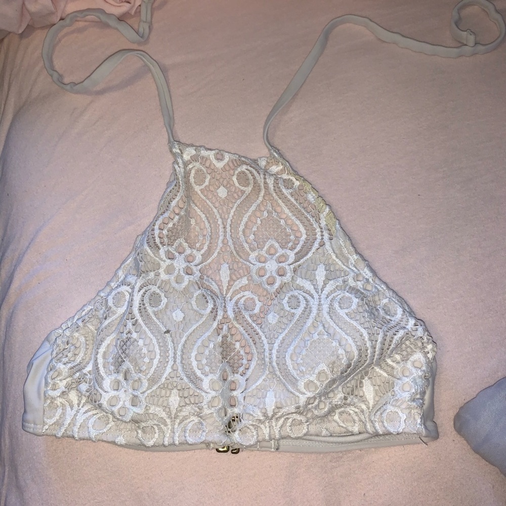 Lacy white halter swimsuit top